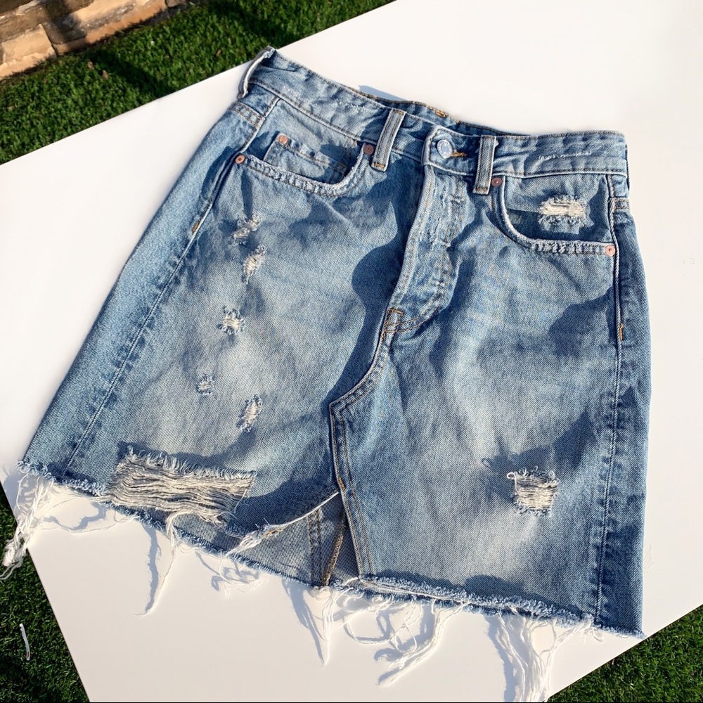 H&M ripped denim skirt. Raw hem.